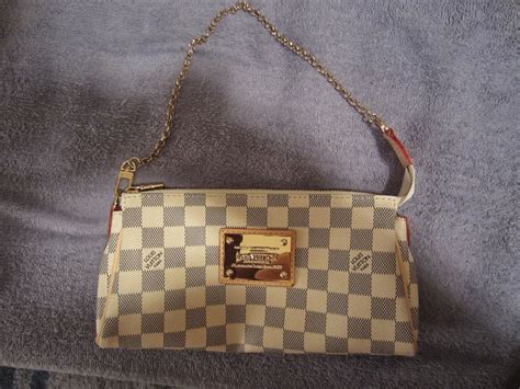 louis vuitton eva clutch fake vs real